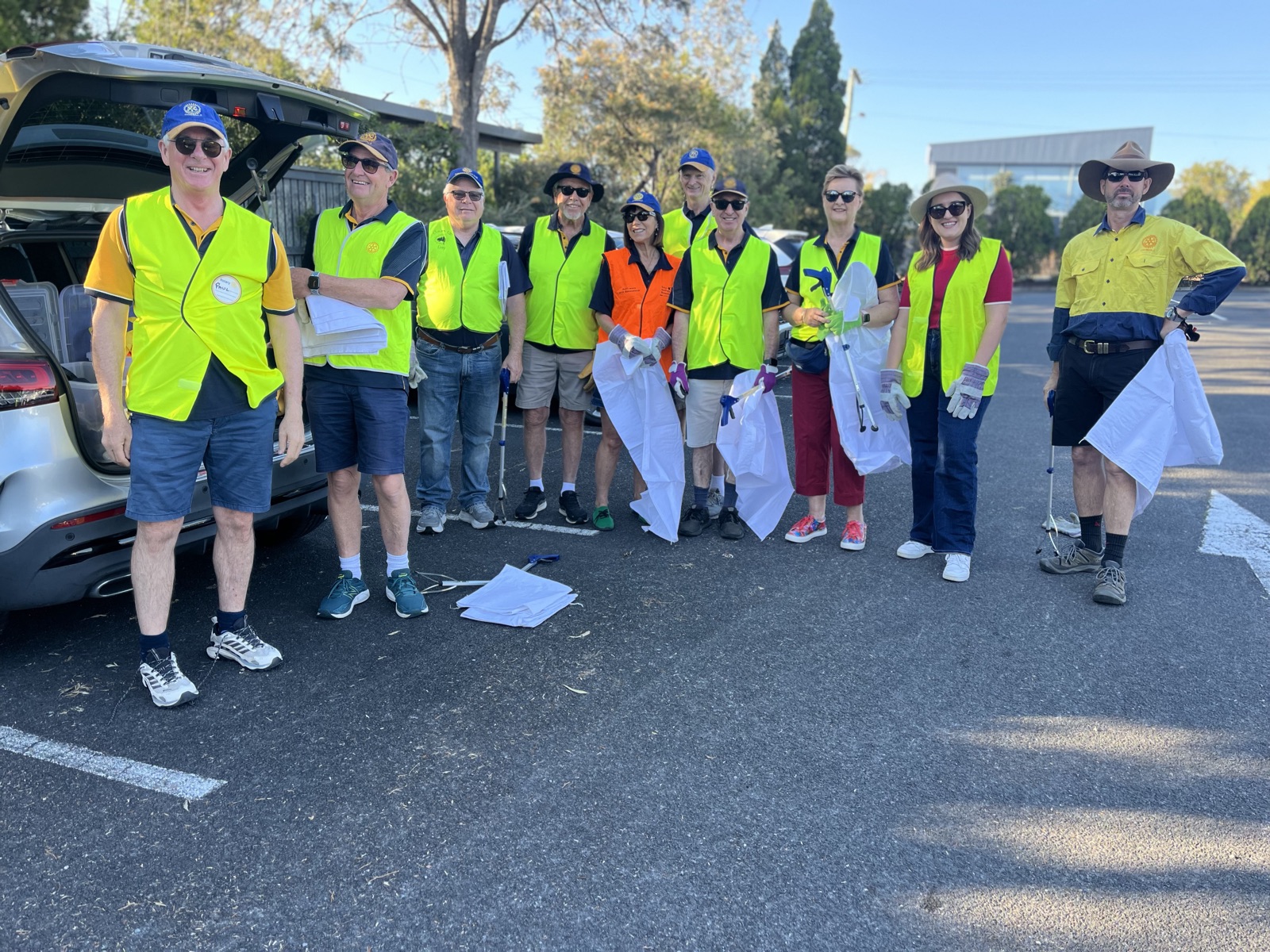 Emi Hall with Lions volunteers at a community clean-up