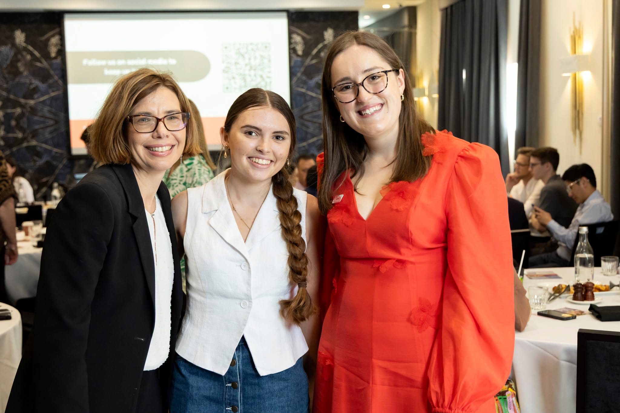 Emi Hall with colleagues at a Carnelian Foundation event