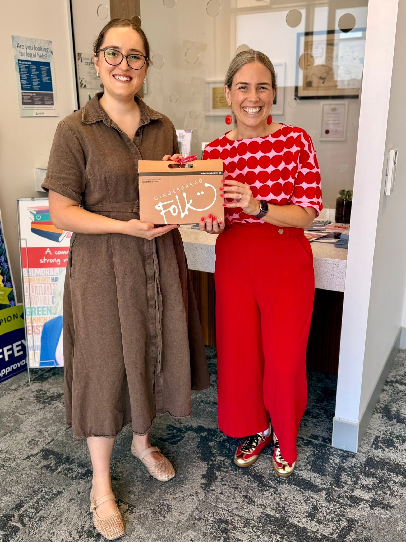 Emi Hall with a local business owner